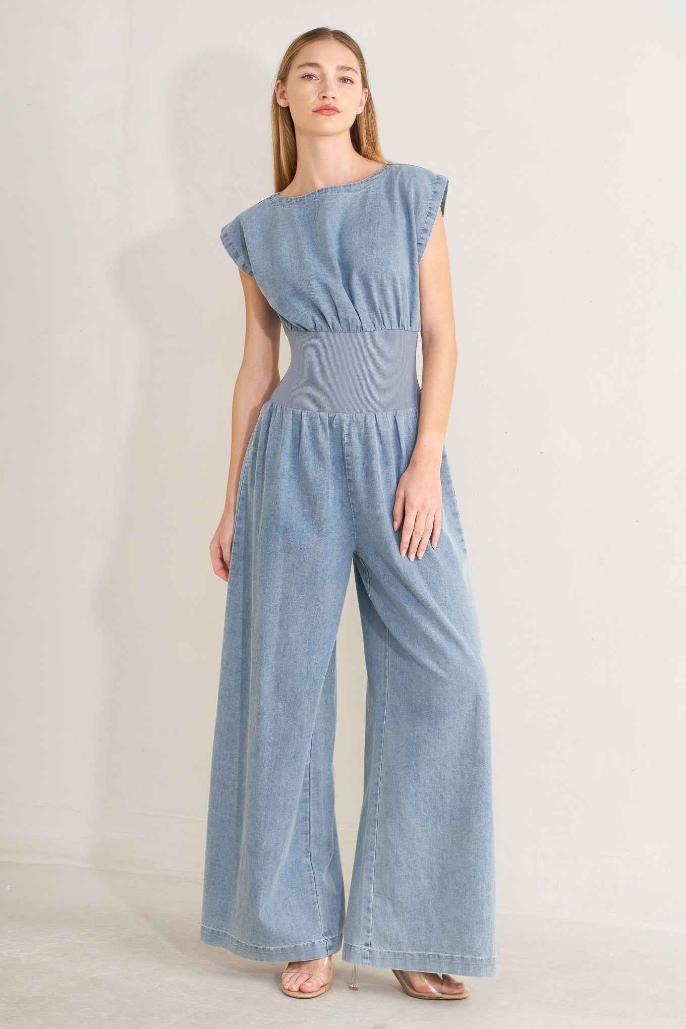 RUNNING IN DENIM JUMPSUIT