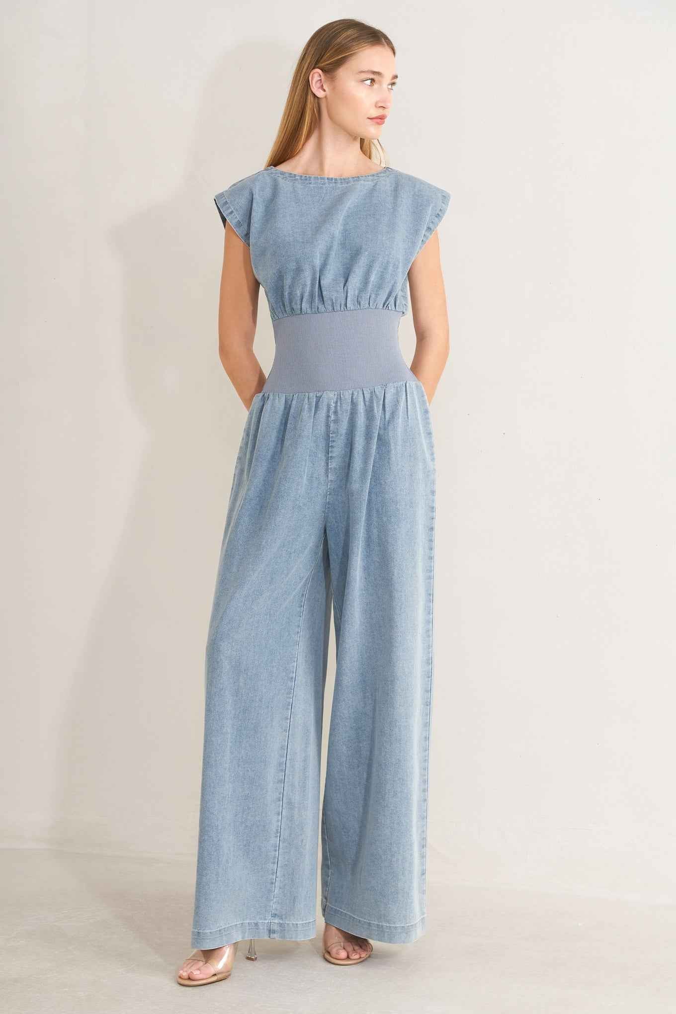 RUNNING IN DENIM JUMPSUIT
